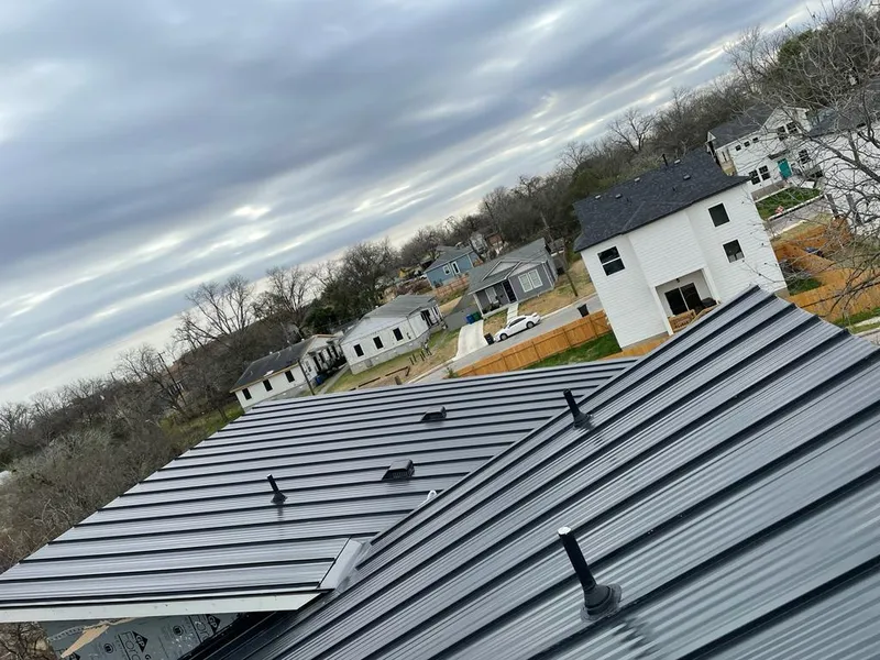 Standing seam metal roof panels with vents for Skylight Repair in Marysville